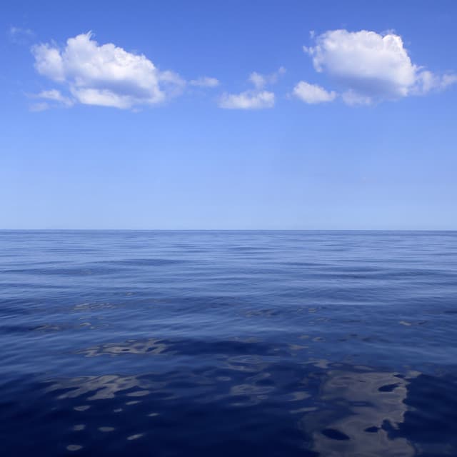 Calm Horizons: Vast Ocean Harmonious Waves - Gazebo Clouds