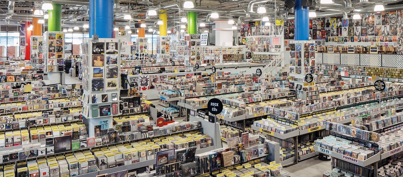 Interior of Amoeba Music Hollywood location showing massive aisles of vinyl records